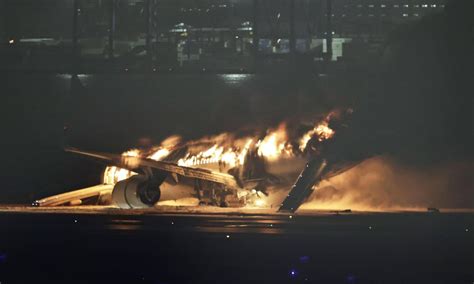 Five dead after Japan Airlines jet collides with coast guard plane at ...