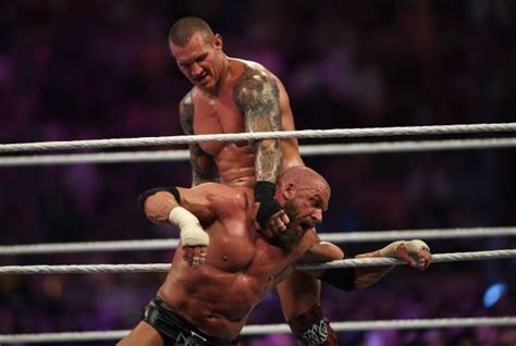 Major Randy Orton vs Triple H Fight Ends in a Mysterious Way on WWE RAW - EssentiallySports