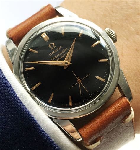 Omega Seamaster Automatic Vintage Calatrava black dial | Vintage Portfolio