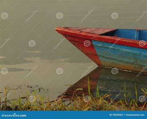 Boat Tied To the Shore of Fewa Lake Stock Image - Image of eating, fishtail: 70549567