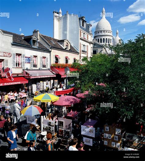 Montmartre the famous Artists Square in Paris, surrounded by cafes and restaurants Stock Photo ...