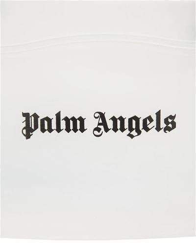 the word palm angels written in black ink