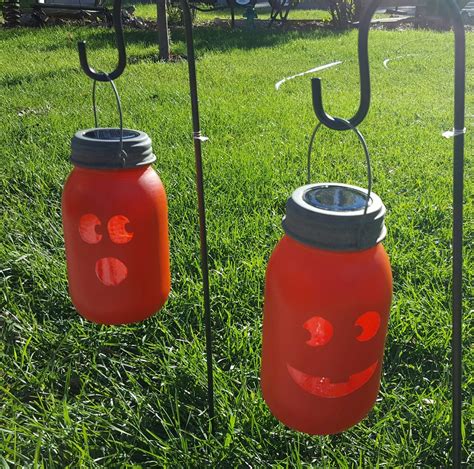 Standard mason jars turned into solar pumpkin lights to brighten your path. | Pumpkin lights ...