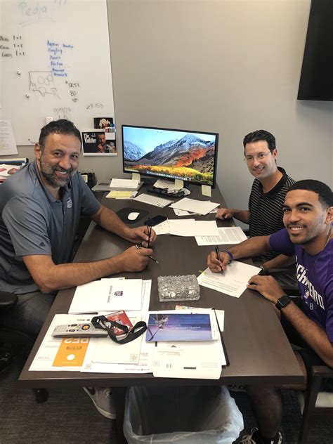 Contract signing at Vlade Divac’s desk made for a revealing photo