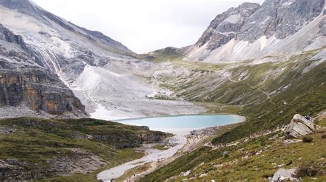 Scenic Landscape of a Valley with a Lake · Free Stock Photo