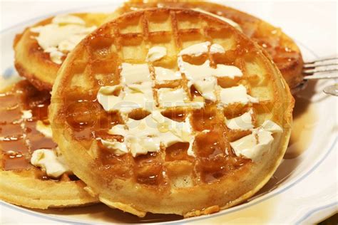 Stack of waffles with butter and syrup | Stock image | Colourbox