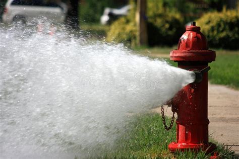 Open Fire Hydrant Gushing High Pressure Water Stock Photo - Image of plug, hookups: 25778276