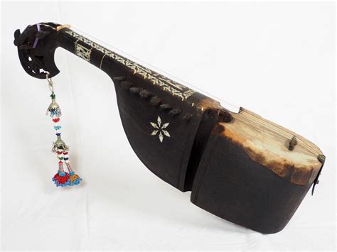 antique traditional folk musical instrument Afghanistan Rubab rabab rabab with mother of pearl inlay