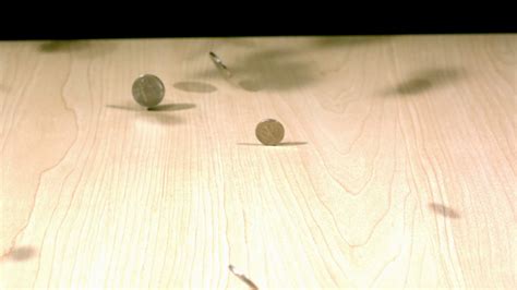 Slow Motion Coins Bouncing Onto Table 1 Stock Footage SBV-300146318 ...