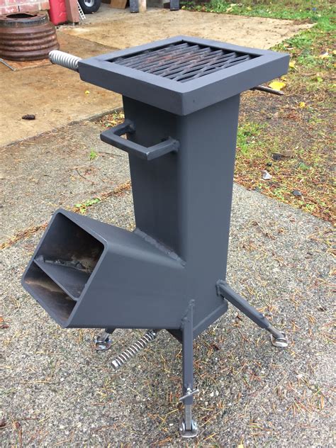 Made with scrap 5" sq tubing and other bits and pieces. The two heat ...