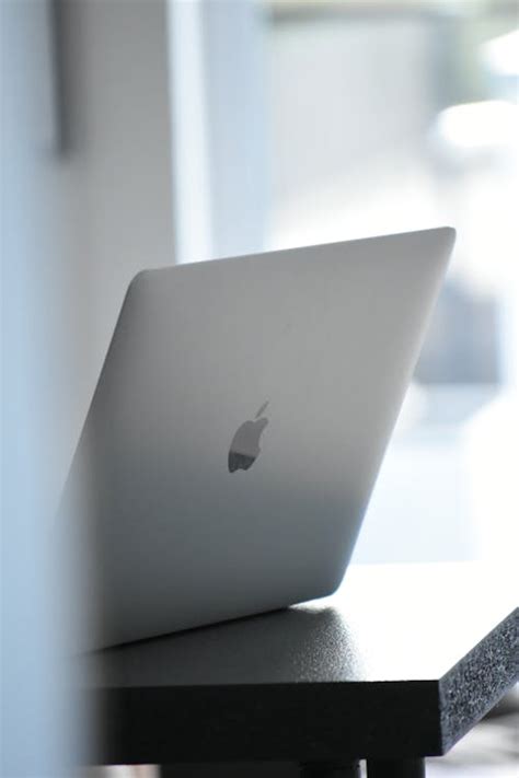 Close-up of a Silver Macbook · Free Stock Photo