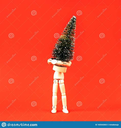 Wooden Mannequin Man Holding in His Hands Large Artificial Christmas ...
