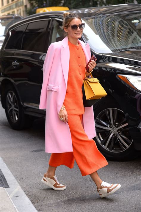 Olivia Palermo Wearing an Orange Suit Dress, Pink Fall Jacket and ...