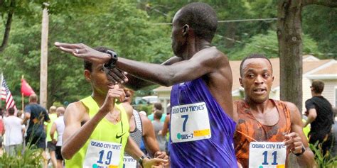 Watch: Bizarre Scuffle Between Bix 7 Runners Could Change Race Results | Runner's World