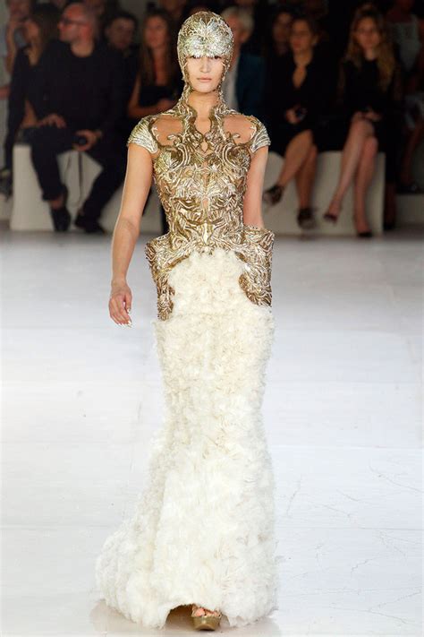 Opulent gold and ivory wedding dress by Sarah Burton for Alexander McQueen