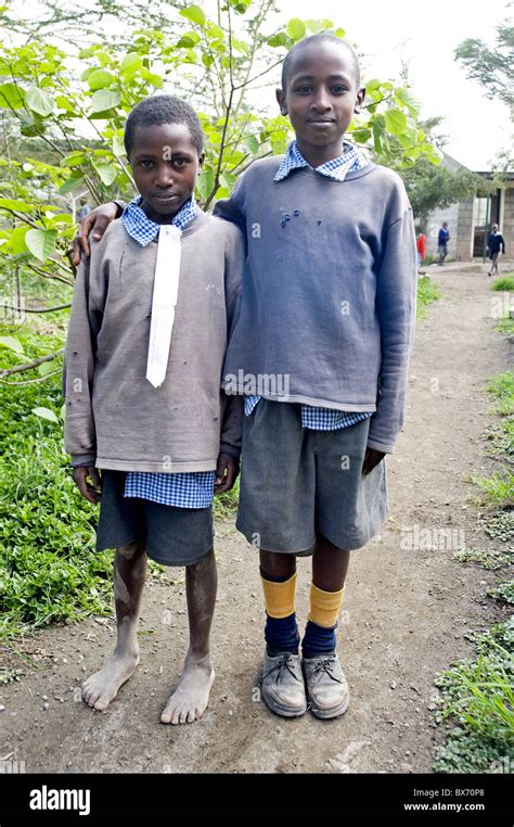 African boy school uniform full length hi-res stock photography and images - Alamy