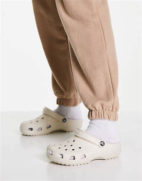 Crocs classic clogs in beige | ASOS