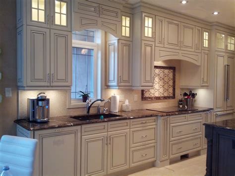 Cabinetry: Kitchen Craft Door style: Paxson Color: Seashell W/ Smoke Glaze Species: Maple ...