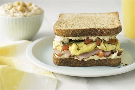 Breakfast Sandwich with Hummus, Scrambled Eggs and Tomato - Half Cup Habit