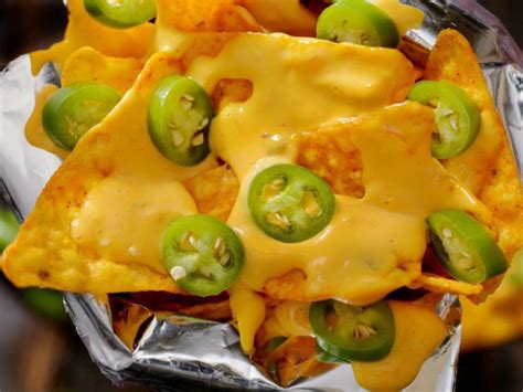 Nacho-Tortilla-Chips-in-a-bag-with-Cheese-Sauce-and-Jalapenos ...