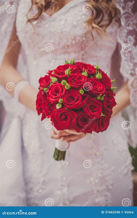 Wedding Bouquet of Flowers Held by a Bride Stock Photo - Image of fashion, beauty: 31663246