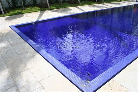 Infinity pool with solid dark blue glass tile - Contemporary - Pool - Miami - by Foreverpools