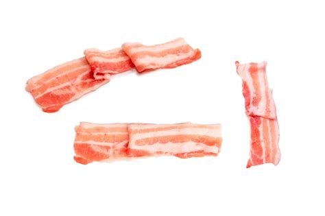 Premium Photo | Raw bacon slices isolated on a white background