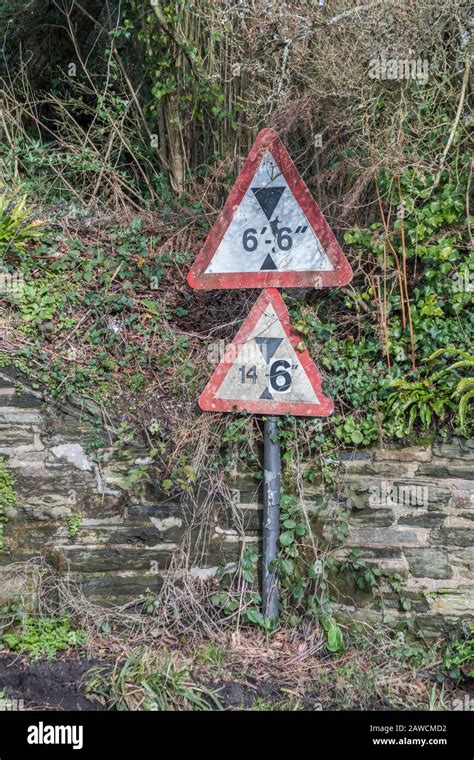 UK bridge clearance height warning sign. Low bridge concept, red triangle warning signs, UK road ...