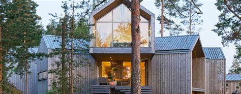 Each room of this Swedish villa extends outward for a private lakeside view