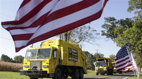 Garbage trucks honor sanitation worker who died on job