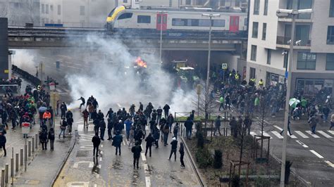 Brussels: Angry farmers launch manure and eggs at police near EU meeting in latest protest ...