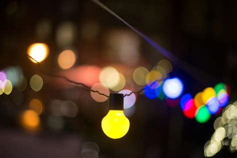 Defocused Image of Illuminated Lights at Night · Free Stock Photo
