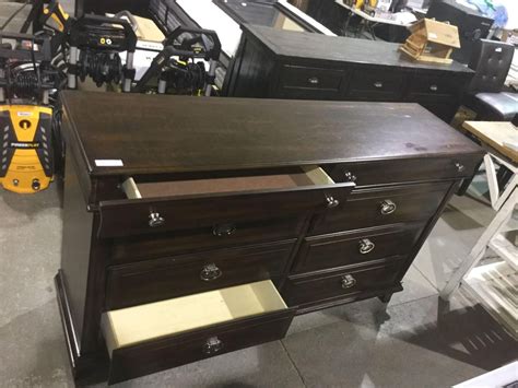 Wooden 8-Drawer Dresser (18"W x 66"L x 39"H) - A D Auction Depot Inc.