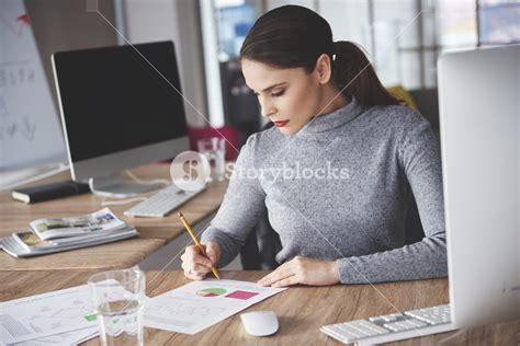 Close up of hard working business woman Royalty-Free Stock Image - Storyblocks