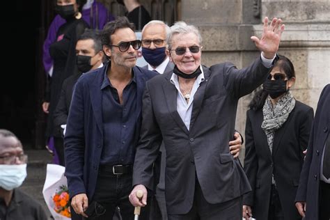 French actor Alain Delon's children accuse his companion of bullying, dog cruelty