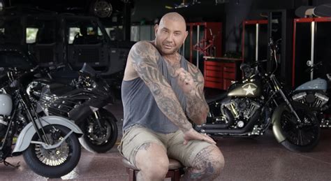 WATCH: Batista Shows Off His Tattoo’s For GQ