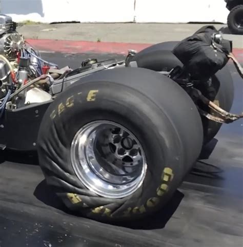 The moment a dragster accelerates, the tire wrinkles. : r/Pictures