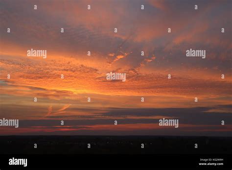 Sunset and colorful clouds Stock Photo - Alamy