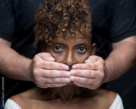 Black woman being silenced by white man in racism Stock Photo | Adobe Stock