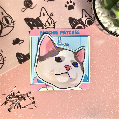 Cute Cat Face Sticker. Each sticker is printed, laminated and cut in the USA by us. There may be ...