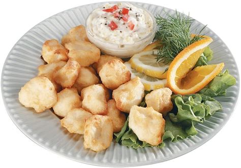 Catfish Nuggets on a Plate with Sauce - Prepared Food Photos, Inc.