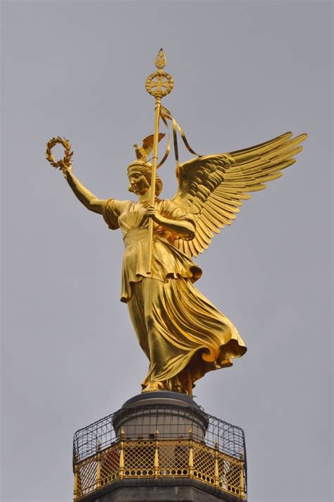 Statue of Victory (Viktoria) atop the Siegessäule in Berlin. The Siegessäule (victory column ...