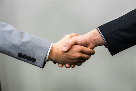 Handshake - Men | Young white men in a suit shaking hands Wh… | Flickr