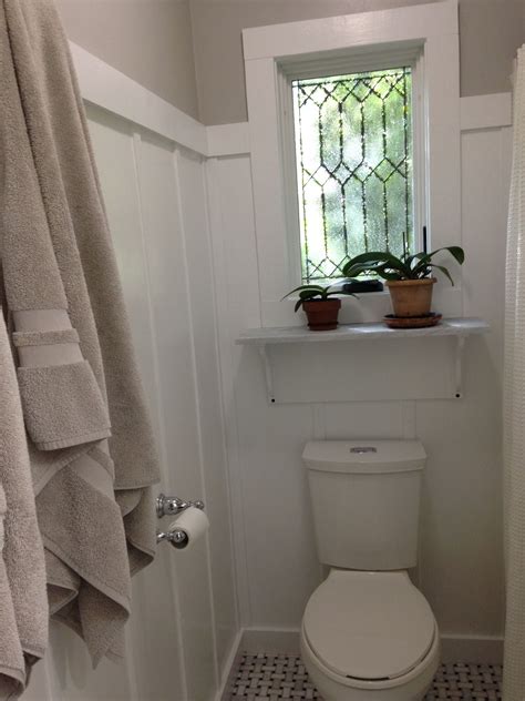 Casement window above the toilet in the bathroom. I added the faux leading and the marble shelf ...