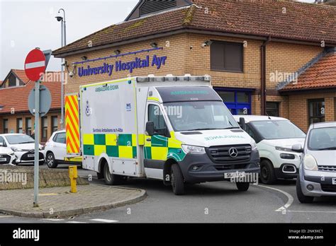 Scottish ambulance parked outside the entrance to University Hospital Ayr, Ayrshire, Scotland ...