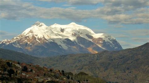 Triple-peaked Illimani mountain. A part of the Cordillera Real de los Andes--the mountain range ...