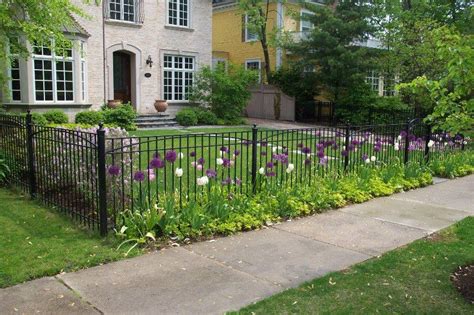 Front Yard Landscaping Ideas With Minimalist Wrought Iron Fence And ...