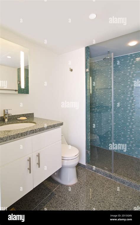 Interior of modern bathroom in beach apartment Stock Photo - Alamy