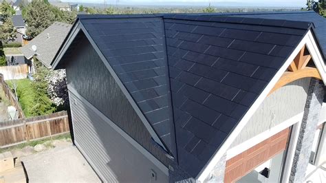 Tesla Solar Shingle Roof Installation - Ellis Custom Homes