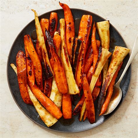 Honey-Roasted Carrots and Parsnips Recipe | Epicurious